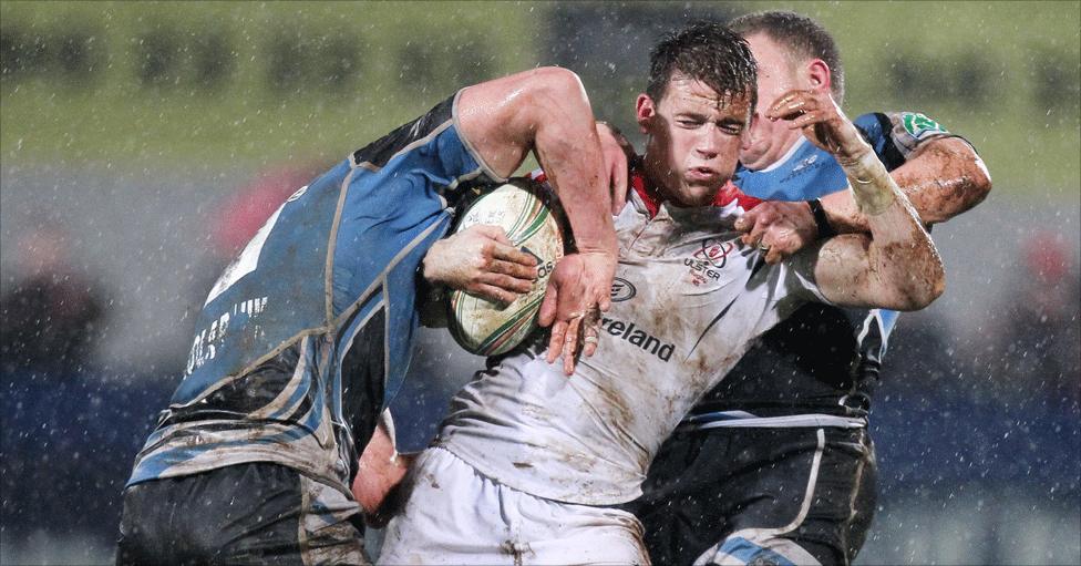 Tom Ryder and Duncan Weir get to grips with Ulster winger Craig Gilroy during the Heineken Cup clash