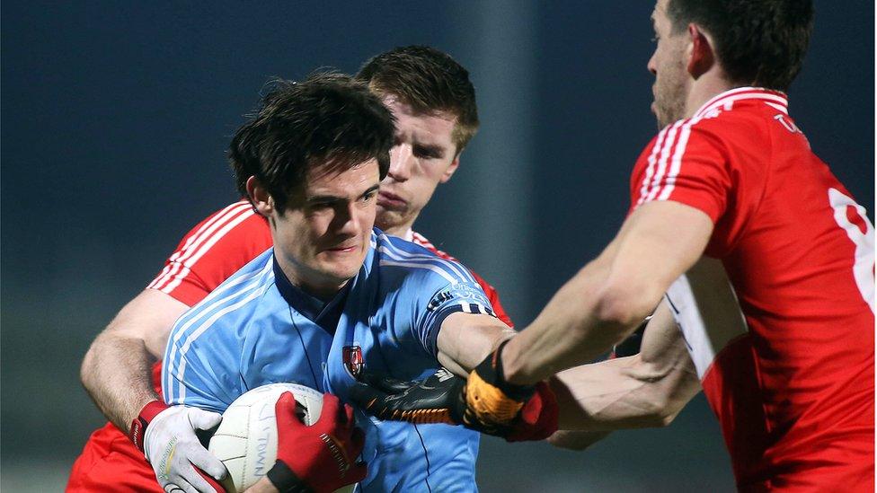 Chrissy McKaigue of UUJ comes under pressure from PJ McCloskey and Blain Gormley during Derry's 1-13 to 0-06 win