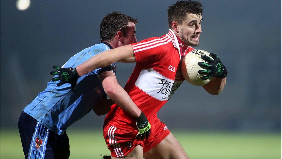 UUJ player Eoin Wade challenges Lee Kennedy of Derry during the McKenna Cup game at Celtic Park