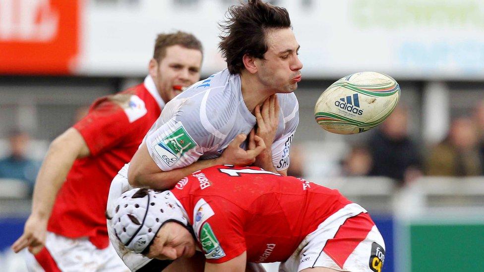 Remi Lamerat is tackled by Ulster's Michael Allen