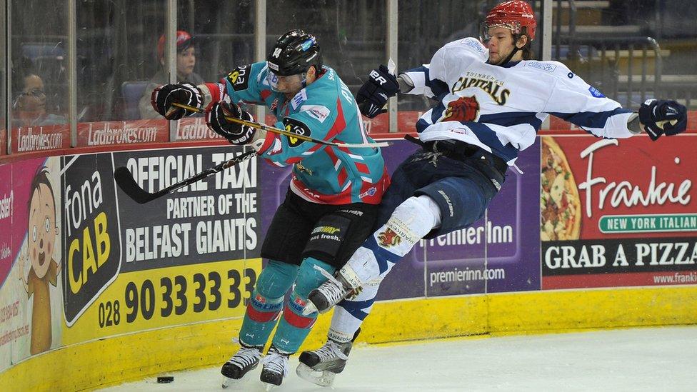 Daymen Rycroft of the Belfast Giants in action against Michal Benadik of the Edinburgh Capitals in the Elite League game in Belfast