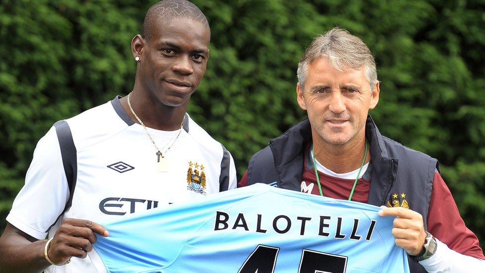 Mario Balotelli and Manchester City manager Roberto Mancini