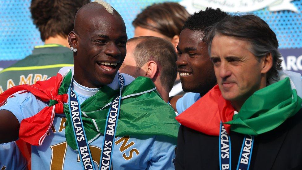 Mario Balotelli with Roberto Mancini