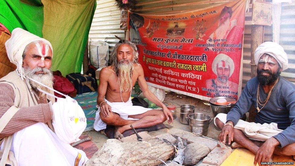 Three men sitting down. Photo: Ranjeet Chakraborty