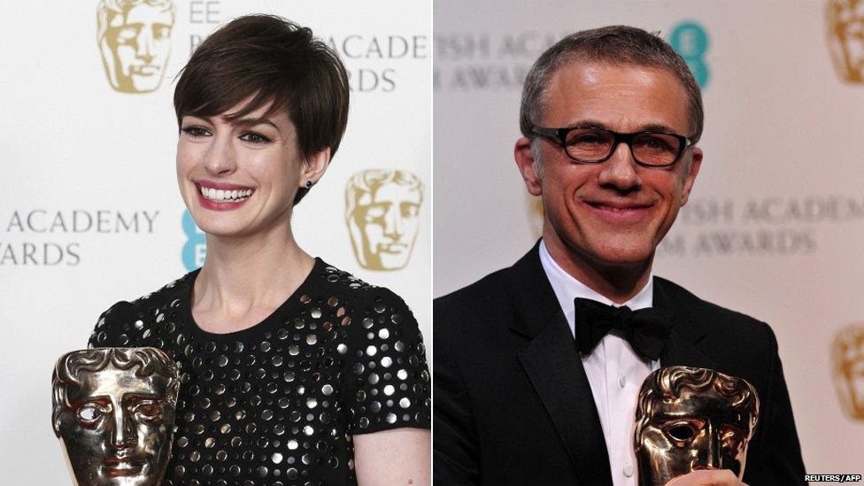 Anne Hathaway and Christoph Waltz