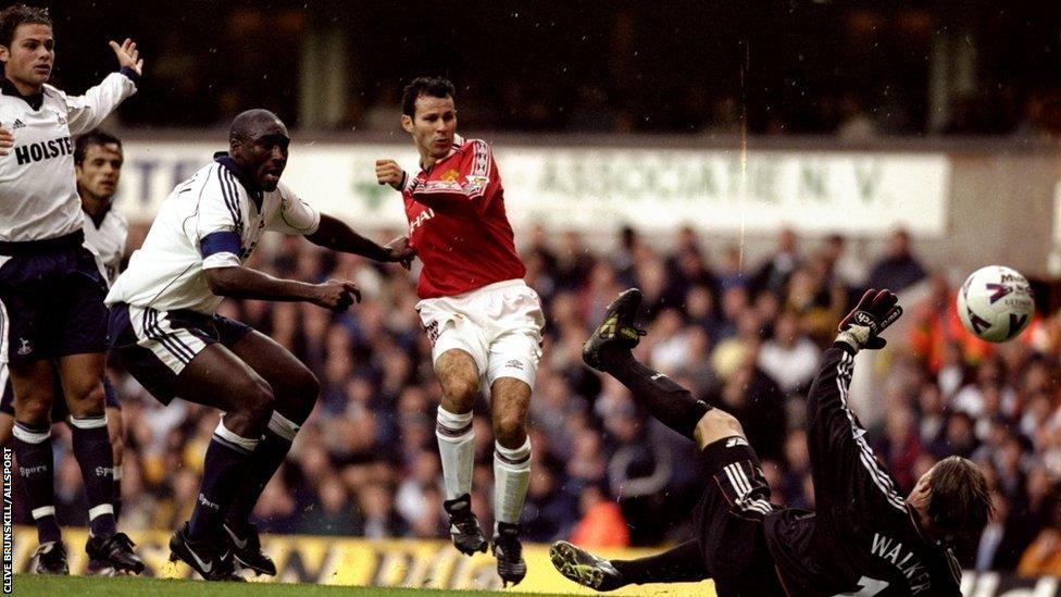 Ryan Giggs scores against Tottenham Hotspur during the 1999-00 season.