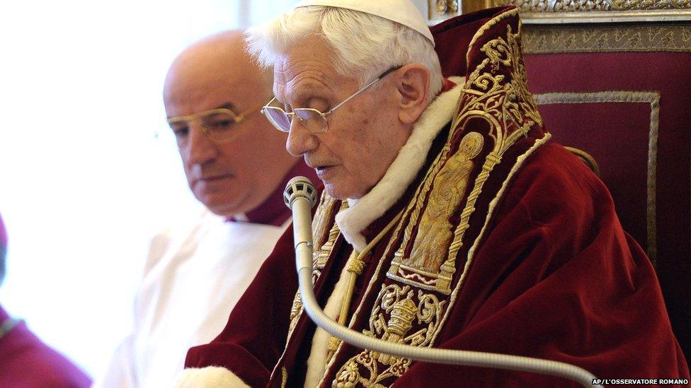 Pope Benedict XVI reading his resignation letter.
