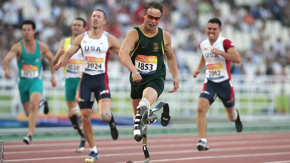 Oscar Pistorius of South Africa wins the 200m in world record time during 2004 Paralympics.