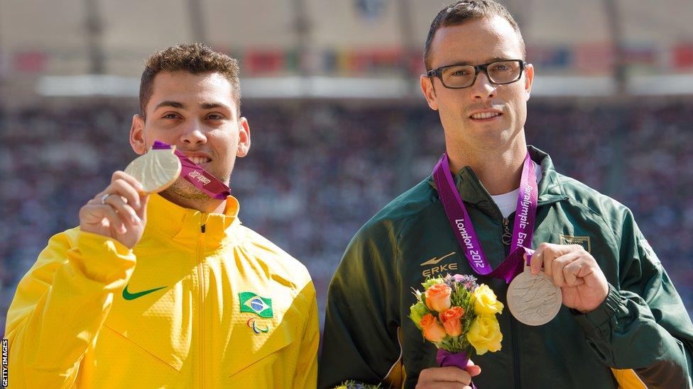 Alan Oliveira (left) of Brazil and Oscar Pistorius.