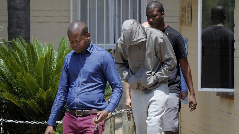 Oscar Pistorius arrested and questioned by police in South Africa.