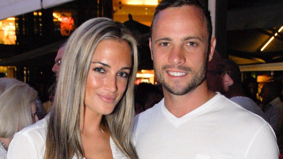 Pistorius, pictured here with Reeva Steenkamp, arrived at a court in South Africa on Friday morning to face charges of murder.