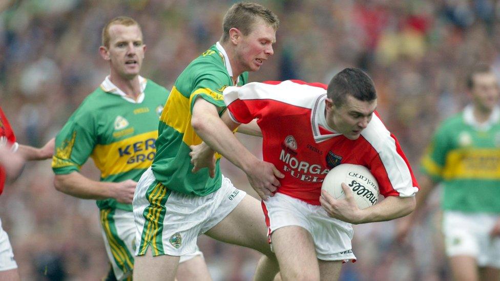 Tomás Ó Sé of Kerry challenges Oisin McConville during the 2002 All-Ireland Football Championship final at Croke Park