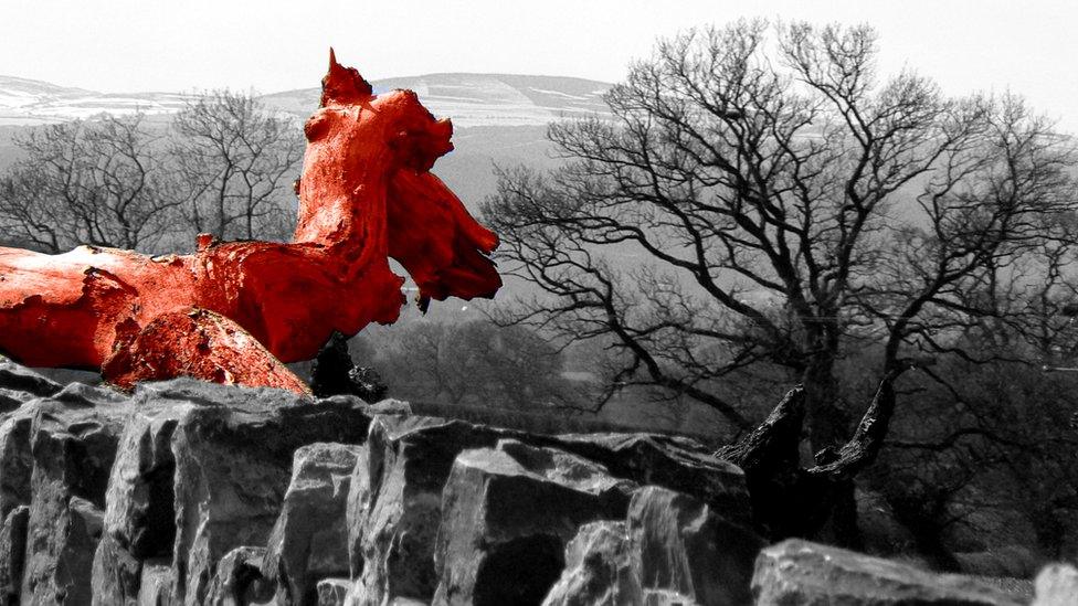 The Red Dragon of Wales has settled in Dyserth overlooking the Vale of Clwyd and Snowdonia in the distance.