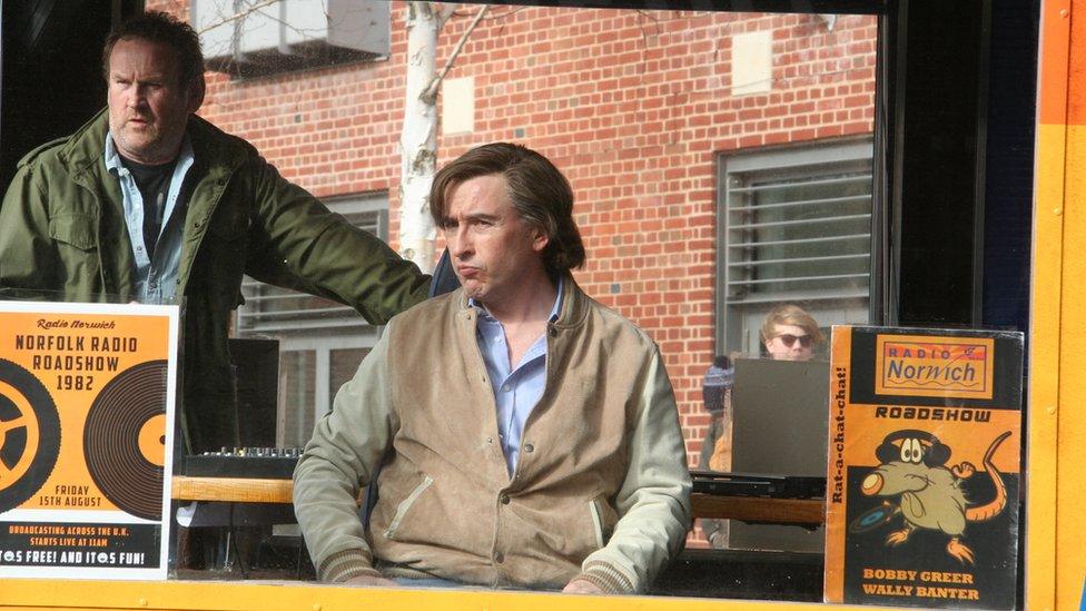 Actors Colm Meaney and Steve Coogan in the outside broadcast van