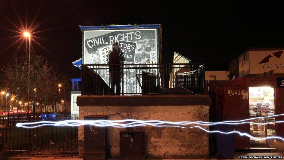 A mural in the Bogside area of Derry commemorates the beginning of the struggle in Derry for democratic rights