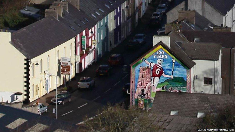 A mural in the village of Cushendall in north Antrim commemorates 100 years of the local Gaelic Athletic Club