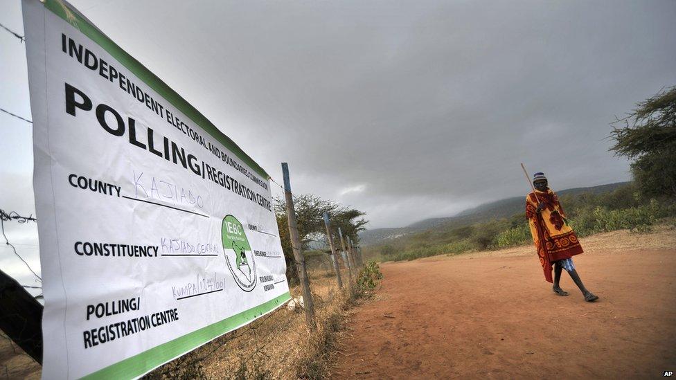 Maasai man walks to polling station in Kumpa
