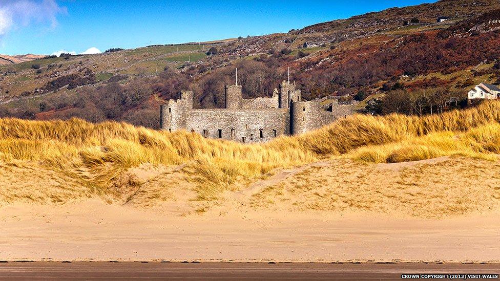 Harlech castle viewed from sand dunes