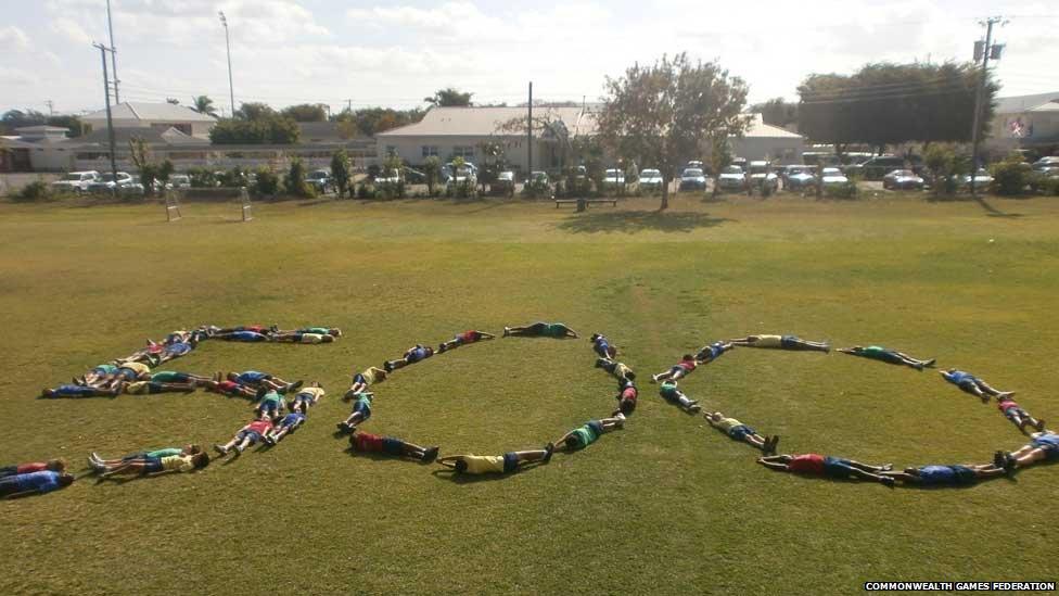 A group in the Cayman Islands join in the celebration