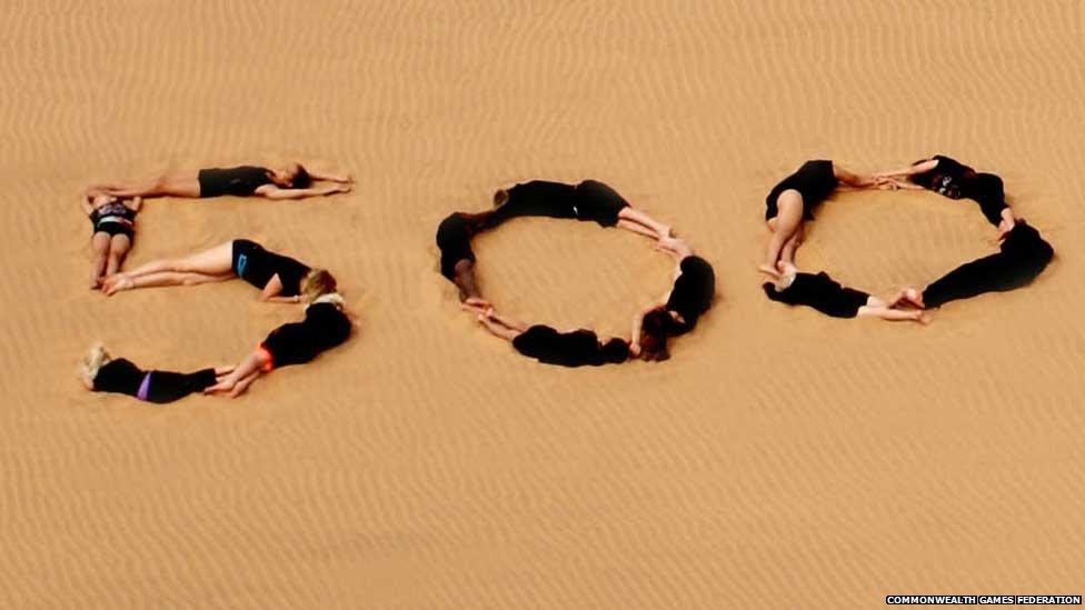 Young gymnasts in the dunes of the Namib Desert in Namibia