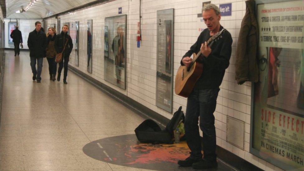 Mick Ward plays to members of the public