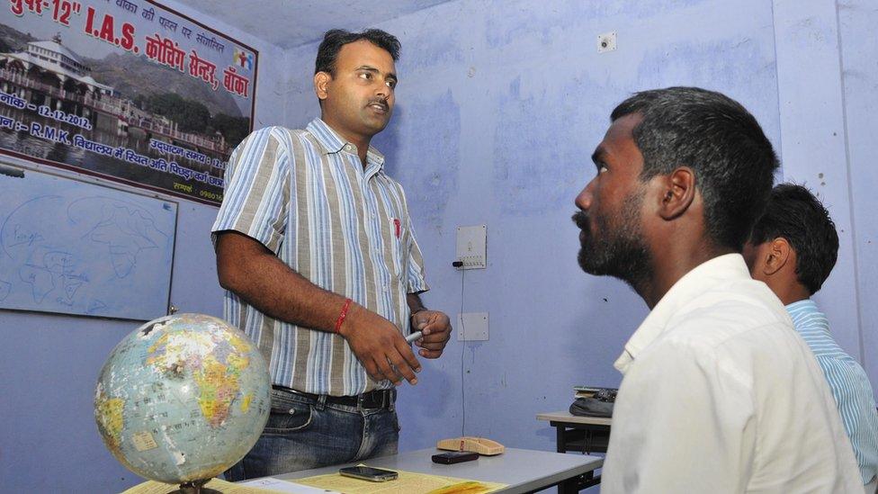 Mithilesh Mishra teaching the selected 12 students