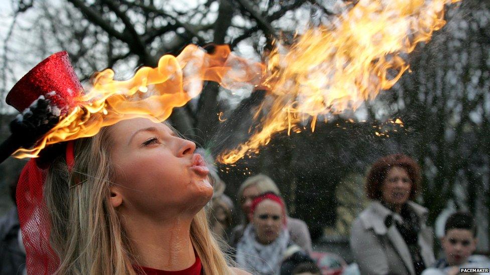 Woman breathing fire