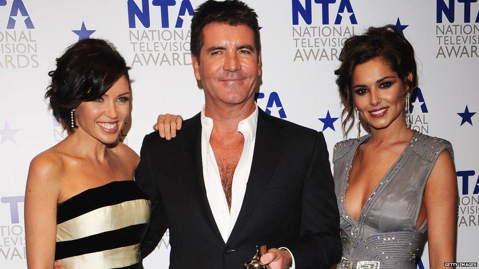 Cheryl with Simon Cowell and Dannii Minogue.