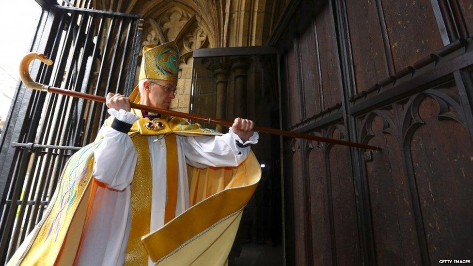 Archbishop Welby enters the Cathedral by knocking three times