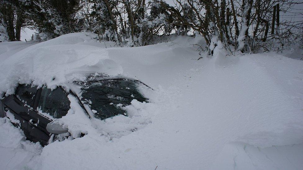 Snow-covered car. Photo: Dave Tipping