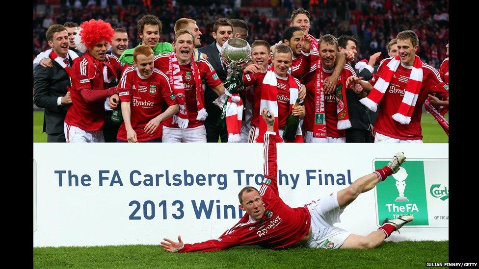 Wrexham players celebrate winning the FA Trophy