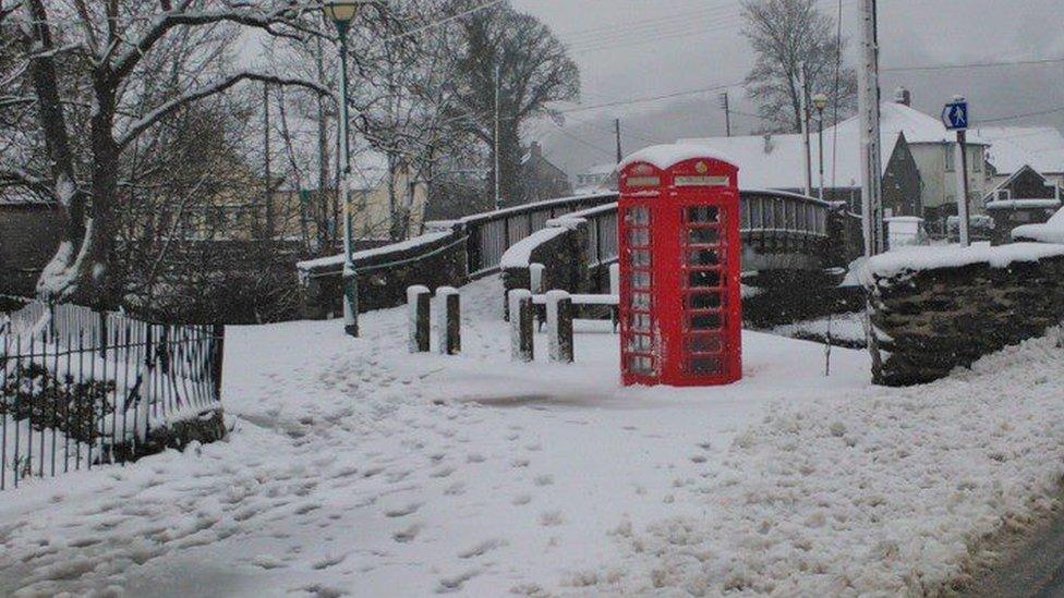 Phone box in snow