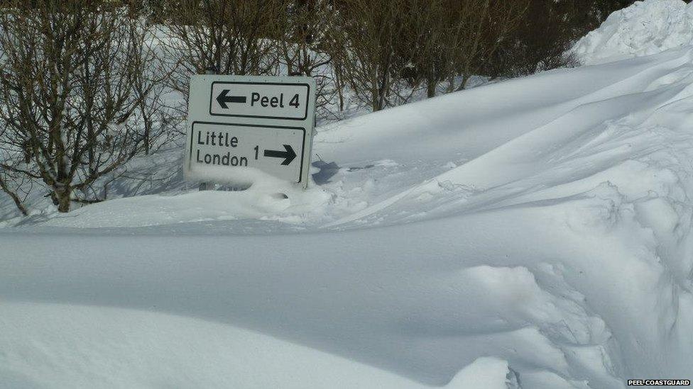 Isle of Man road sign after heavy snow in March 2013