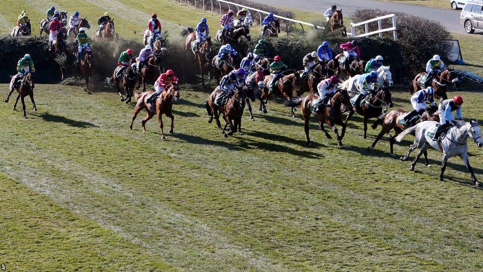 Horses jump Becher's Brook