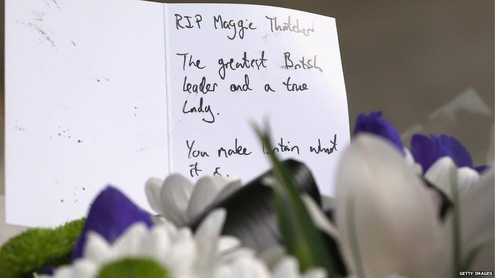 Card and flowers left after the death of Margaret Thatcher.