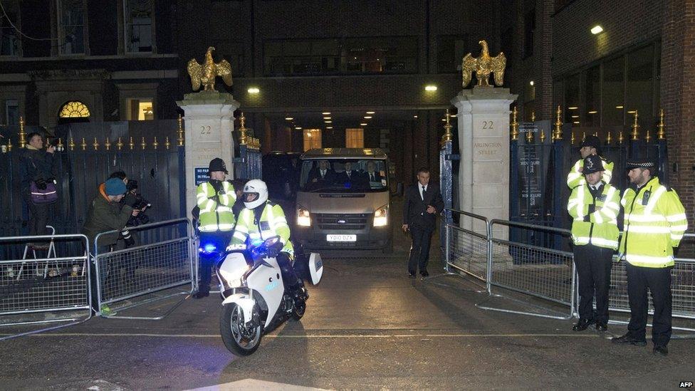 A private ambulance is escorted by a police outrider as it leaves the Ritz hotel in London on 8 April 2013 following the death of former British prime minister Margaret Thatcher, who was staying at the hotel.