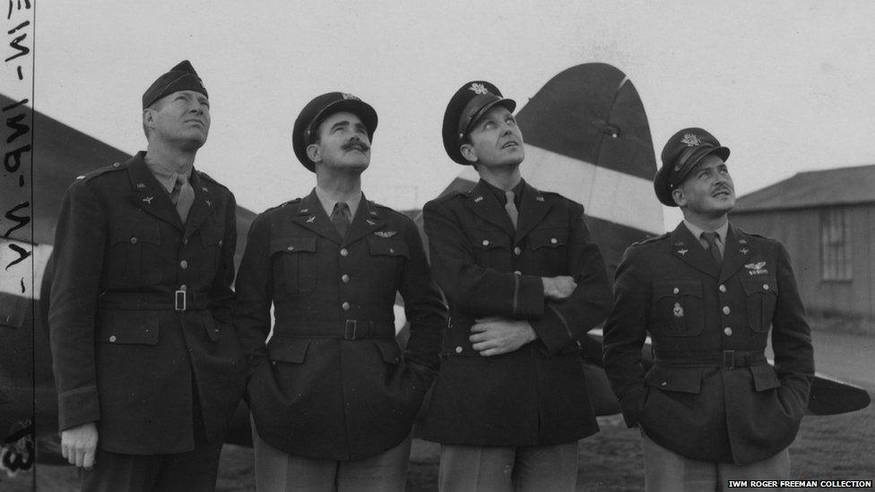 Members of the 78th Fighter Group watch a mission take-off