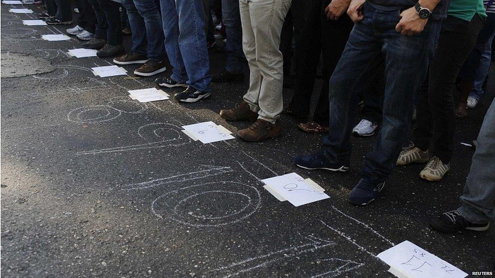 Venezuelans line up in numbered rows to vote