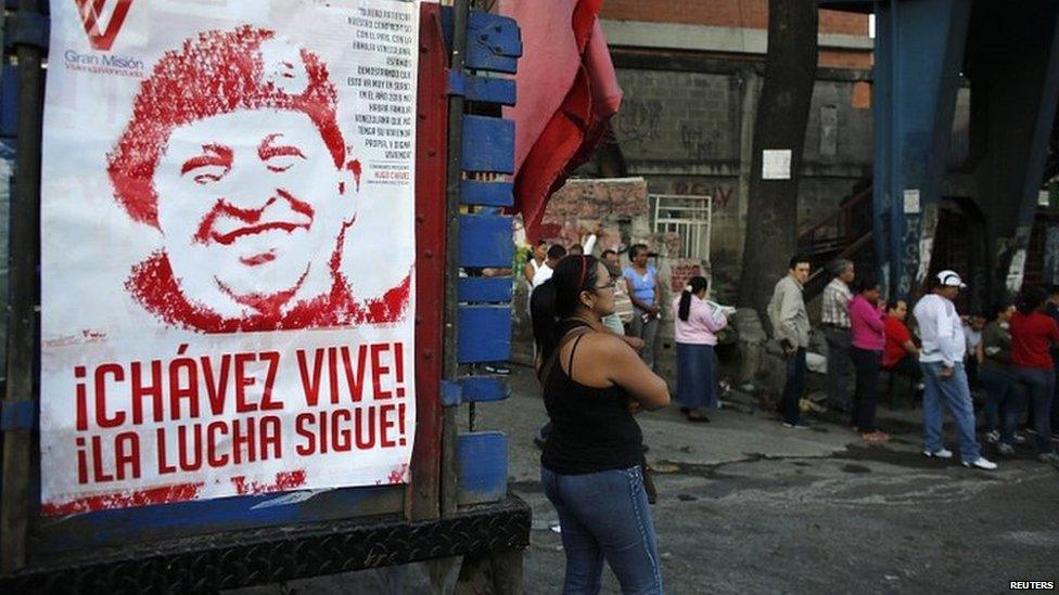 Venezuelans line up to vote in Caracas for a successor to late President Hugo Chavez