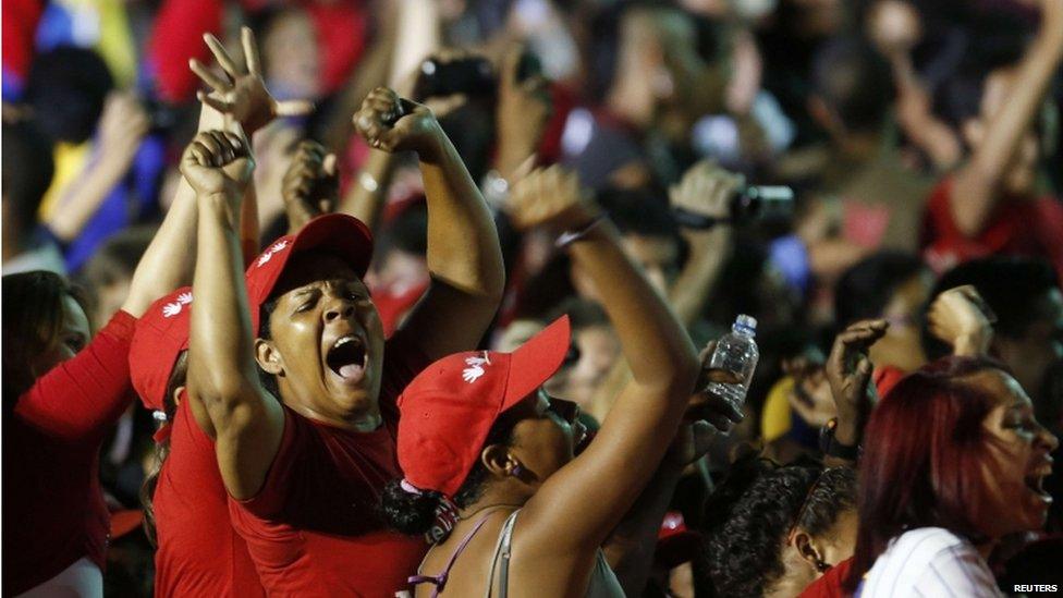 Supporters of Nicolas Maduro celebrate the announcement of his victory in the presidential election