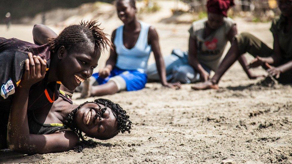 Two women wrestlers train