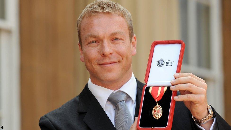 Chris Hoy with the knighthood medal he received at Buckingham Palace