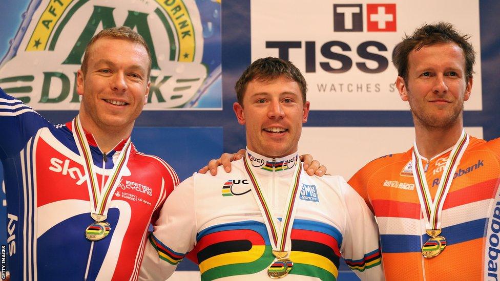 Chris Hoy (left) celebrates winning silver on the podium with Shane Perkins (centre) and Tuen Mulder after the keirin final during the World Championships in Apeldoorn, Netherlands