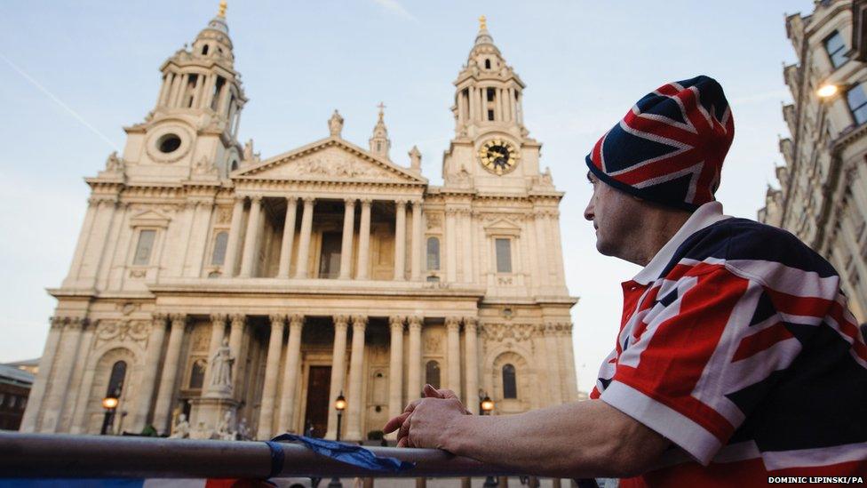 John Loughrey waits outside St Paul's Cathedral, in central London, to watch the funeral of former Prime Minister Margaret Thatcher