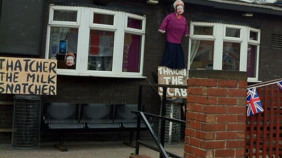 Homemade effigy of Margaret Thatcher and banners in Goldthorpe