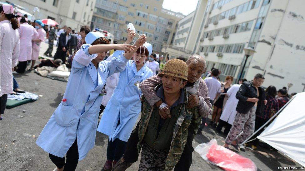 Injured people receive medical treatment at the People's Hospital after a strong magnitude earthquake hit Lushan county, Sichuan province