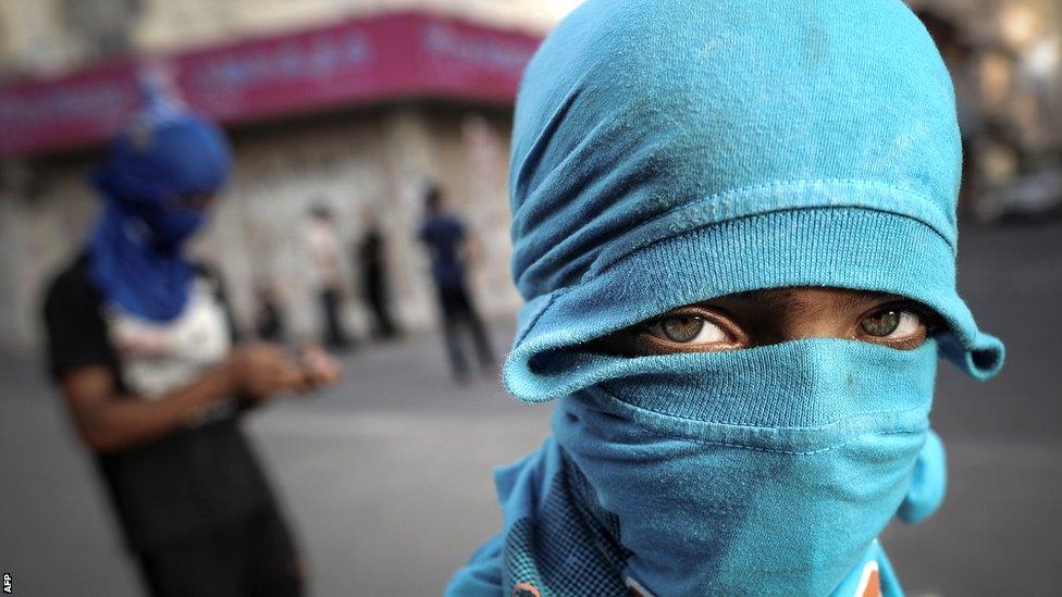 A masked protester against the Bahraini regime