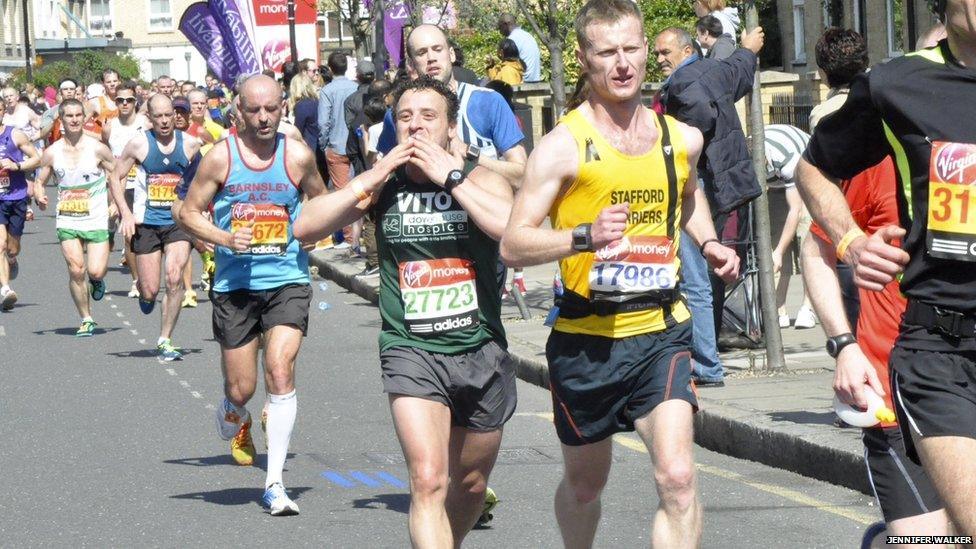 Runner blows a kiss to the crowd. Photo: Jennifer Walker