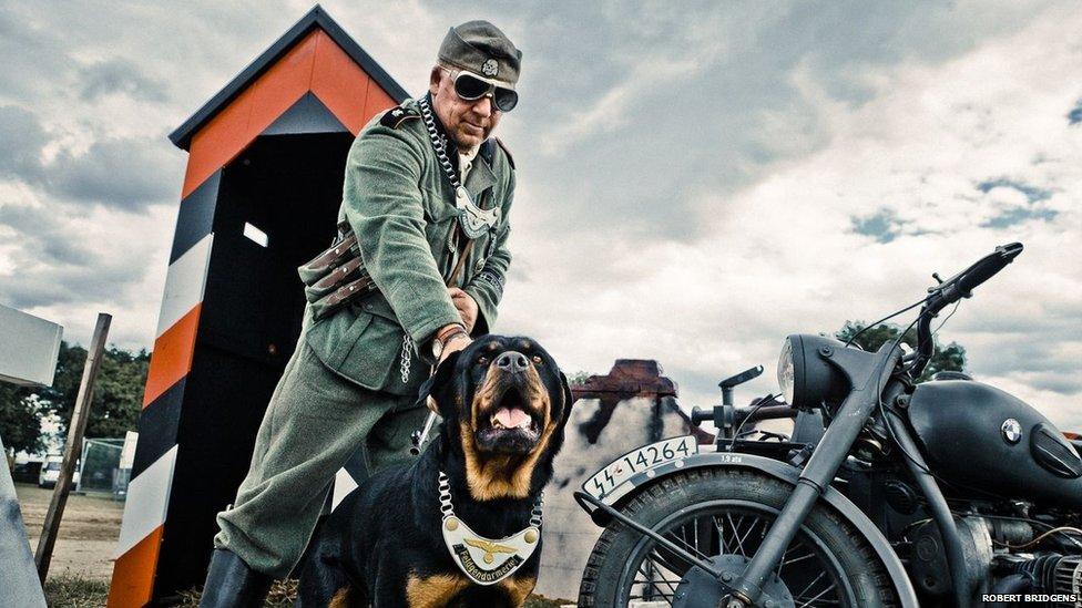 World War II re-enactment featuring a German guard