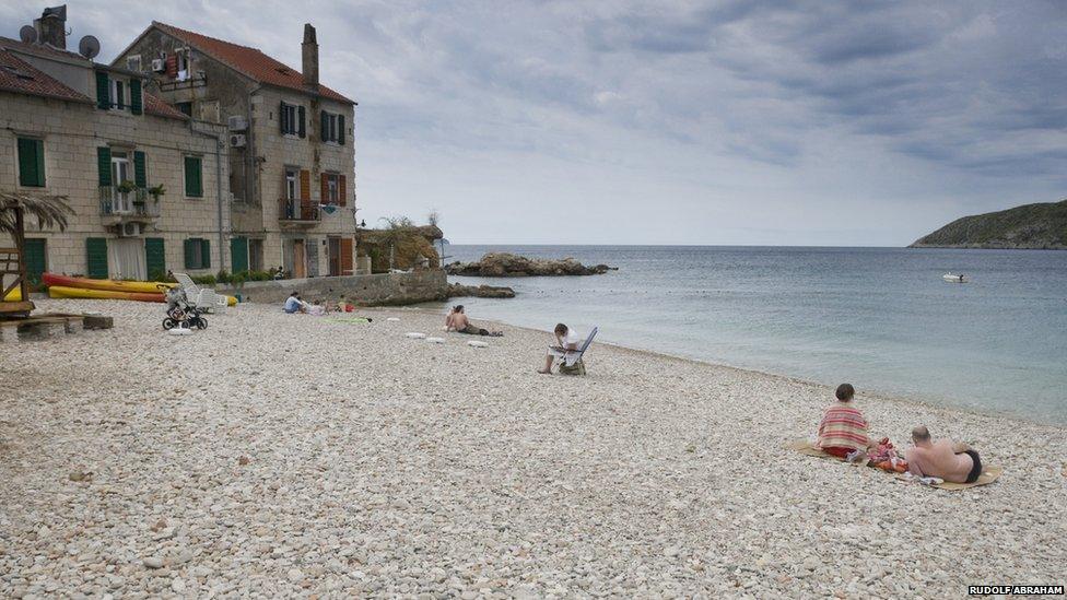 Beach in Komiza, on the island of Vis, one of the many inhabited islands off the Dalmatian coast of Croatia. Vis was used as one the World War II base of the Partisan leader Josip Broz Tito who went on to become Yugoslavia's president until his death in 1980.